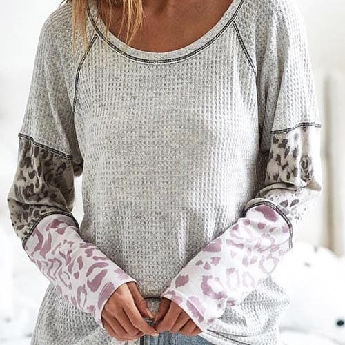SKM Collection women's leopard block sleeve top